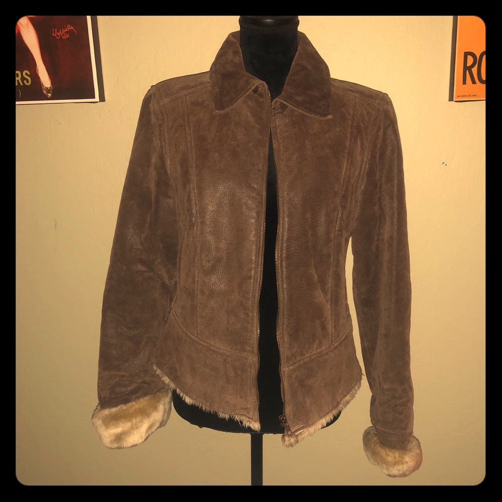 Brown leather jacket with fuzzy inside. So Warm!